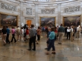 Snapshot of a crowd of people on a guided tour through the Rotunda of the U.S. Capitol