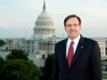 Photo of Stephen T. Ayers, FAIA, LEED AP, Architect of the Capitol in front of the Capitol Building