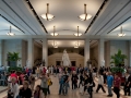 A crowd of visitors walking through the Capitol Visitor Center.