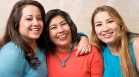 Portrait of three Latina women.