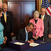Speaker John Boehner signs the Workforce Innovation and Opportunity Act (H.R. 803), which would improve and streamline job training programs for those who are out of work.