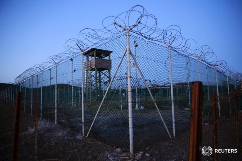 FILE PHOTO -  Chain link fence and concertina wire surrounds a deserted guard tower within Joint Task Force Guantanamo's Camp Delta at the U.S. Naval Base in Guantanamo Bay, Cuba March 21, 2016.  REUTERS/Lucas Jackson/File Photo - RTX2L3G8