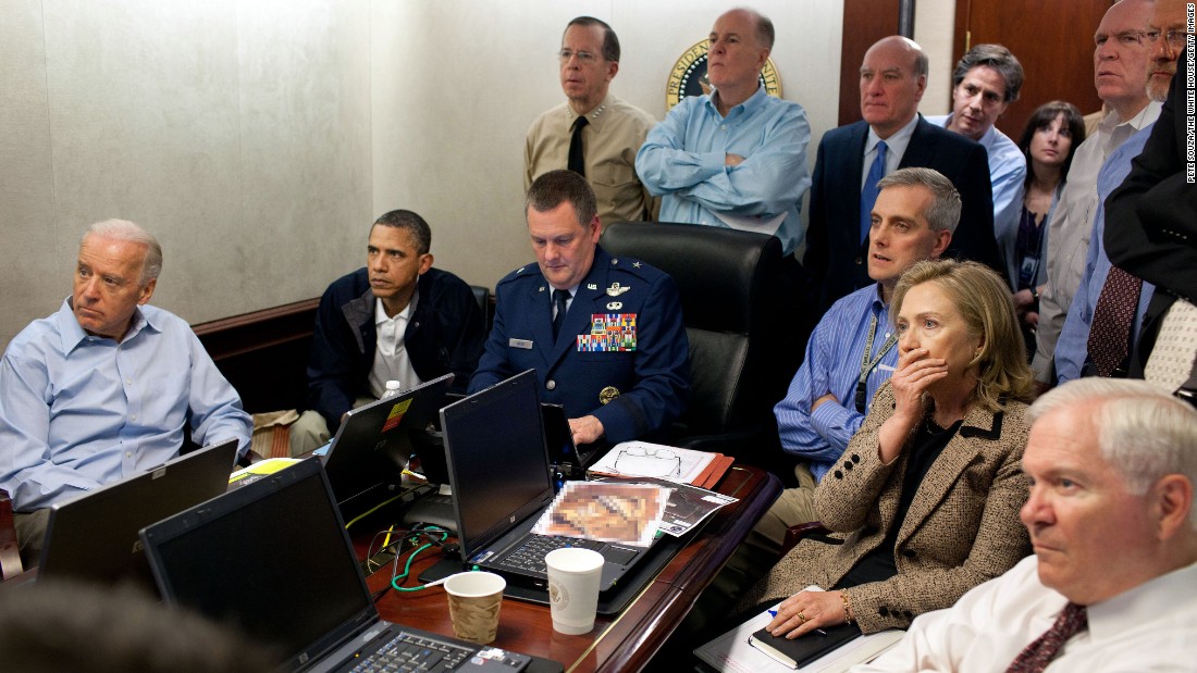 President Barack Obama, Vice President Joe Biden, then-Secretary of State Hillary Clinton and members of the national security team receive an update on the mission against Osama bin Laden in the Situation Room of the White House on May 1, 2011. 