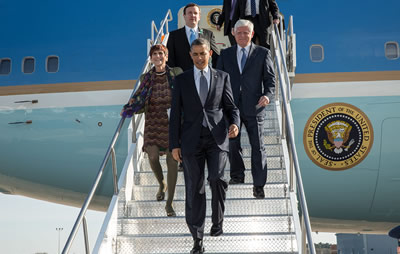 Larson exits Air Force One with President Barack Obama