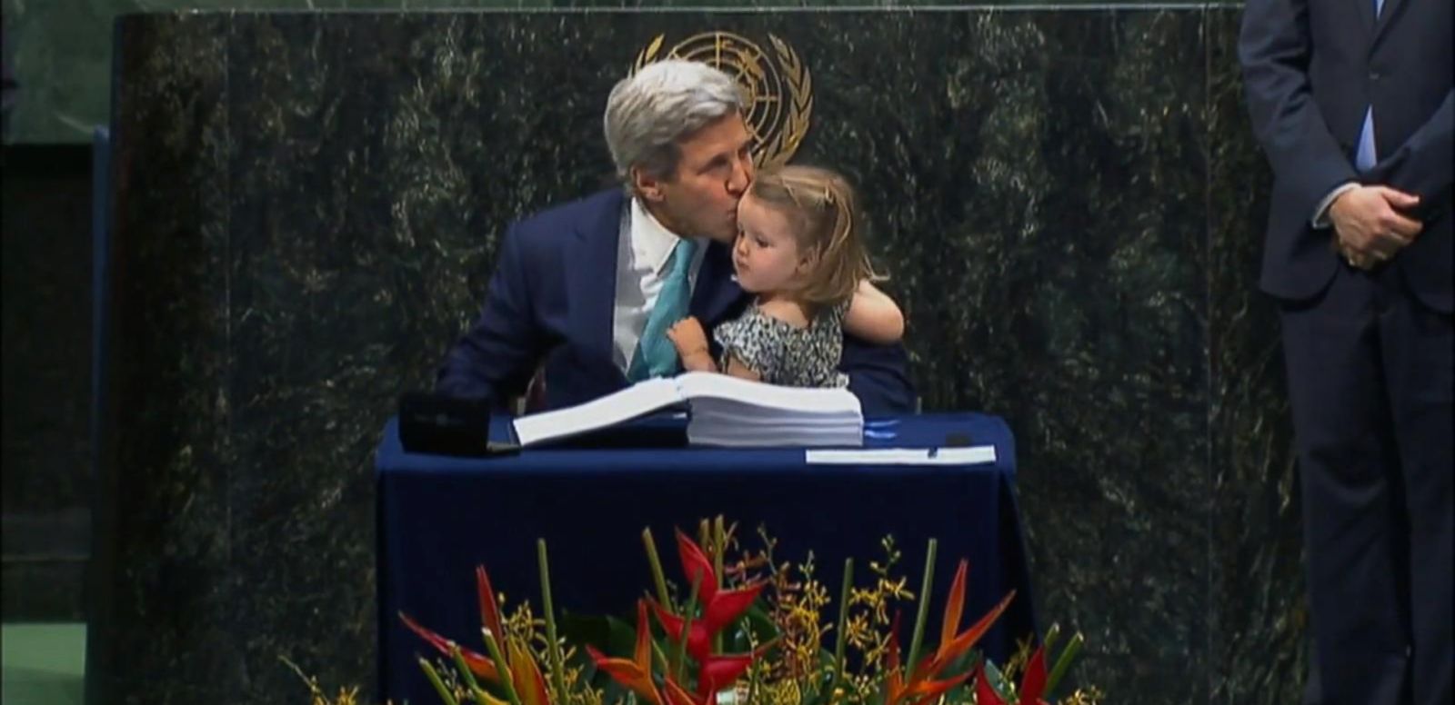 VIDEO: John Kerry Signs Paris Agreement With Granddaughter on Lap