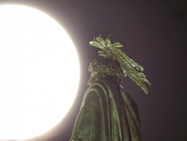 Supermoon rises over the Statue of Freedom on evening of June 22, 2013.