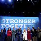 From left, Sen. Cory Booker, D-N.J.; former U.S. Secretary of State Madeleine Albright; actress Debra Messing; Sen. Bob Casey, Jr., D-Pa.; musician Katy Perry; Democratic presidential candidate Hillary Clinton; candidate for U.S. Senate Katie McGinty; candidate for U.S House of Representative; Dwight Evans, Rep. Bob Brady, D-Pa., and television producer Shonda Rhimes appear on stage during a Get Out the Vote concert at the Mann Center for the Performing Arts in Philadelphia, Saturday, Nov. 5, 2016. (AP Photo/Andrew Harnik)