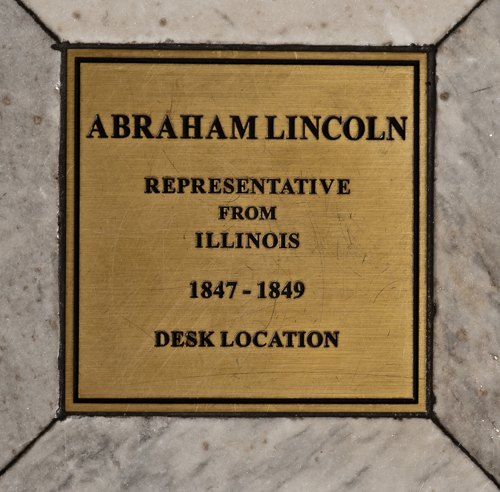 Floor bronze marker of Abraham Lincoln's desk.