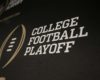 The College Football Playoff logo is printed across a backdrop used during a news conference where the 13 members of the committee were announced, Wednesday, Oct. 16, 2013, in Irving, Texas. Former Secretary of State Condoleezza Rice, former Nebraska coach Tom Osborne and College Football Hall of Fame quarterback Archie Manning are among the 13 people who will be part of the College Football Playoff selection committee in 2014. (AP Photo/Tony Gutierrez)