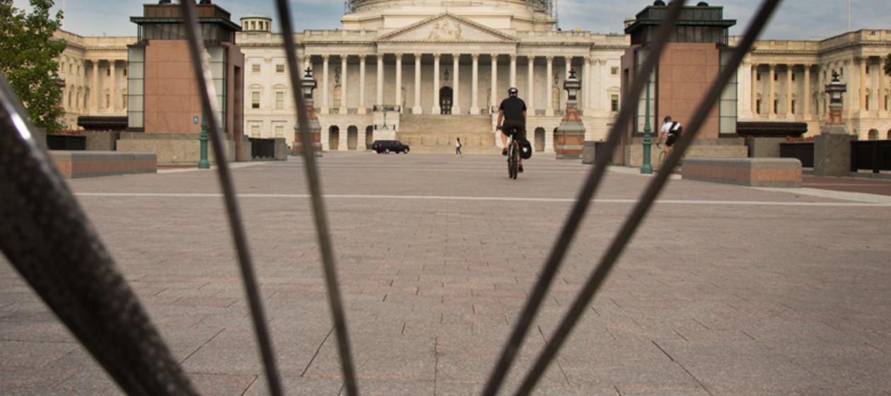 Capitol view through bicycle spokes.