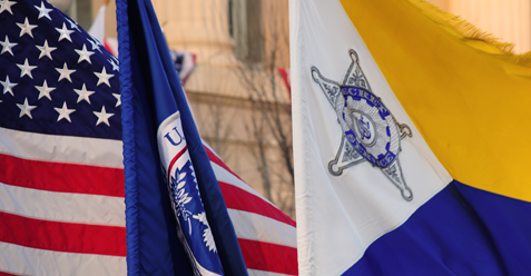 Secret Service flags alongside the American flag