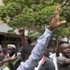 Supporters of Raila Odinga, Kenya's prime minister and a presidential candidate, stage a protest outside the Supreme Court in Nairobi, Kenya, March 30, 2013. The court announced Saturday that the March presidential election results are valid and that Uhuru Kenyatta has won.