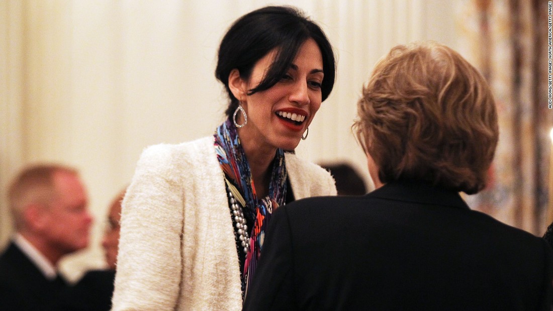 Abedin talks with a guest during an Iftar dinner at the White House August 10, 2011. 