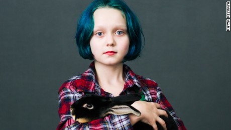 Virginia Anderson (10) from Dallas, Oregon with her bunny Romeo (6 months) of «Black Otter Rex» breed  she just bought at the show. 
Raising rabbits for 3 years and now has 34 rabbits of 5 breeds.
«I have a rabbit called Minerva. She is my favorite because when I get sick I get her and cuddle and she makes me feel better. For one of the shows she spent at least 20 minutes on stage in a mask of Phantom of the Opera».