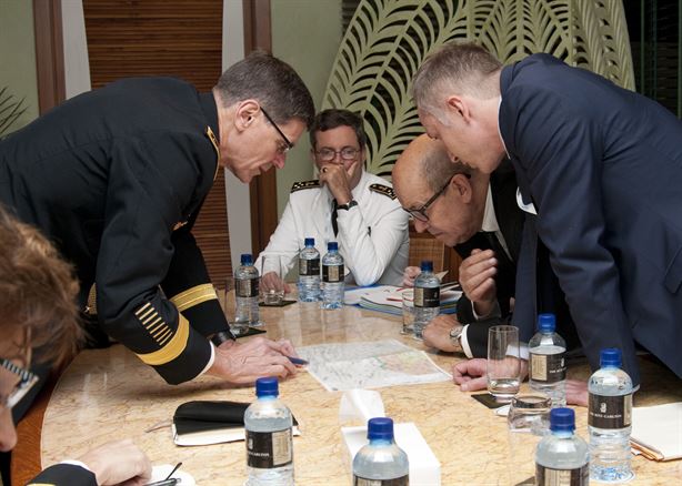 MANAMA, Bahrain (Dec. 10, 2016) From left, Commander of U.S. Central Command Gen. Joseph Votel reviews a map with French Advisor to the Minister of Defense Vice Adm. Herve de Bonnaventure and French Minister of Defense and Veteran Affairs Jean-Yves Le Drian during the 12th International Institute for Strategic Studies (IISS): The Manama Dialogue. IISS Manama Dialogue provides a platform to exchange views on political, economic, social and security challenges around the Middle East and North Africa. (U.S. Navy photo by Petty Officer 2nd Class Victoria Kinney)