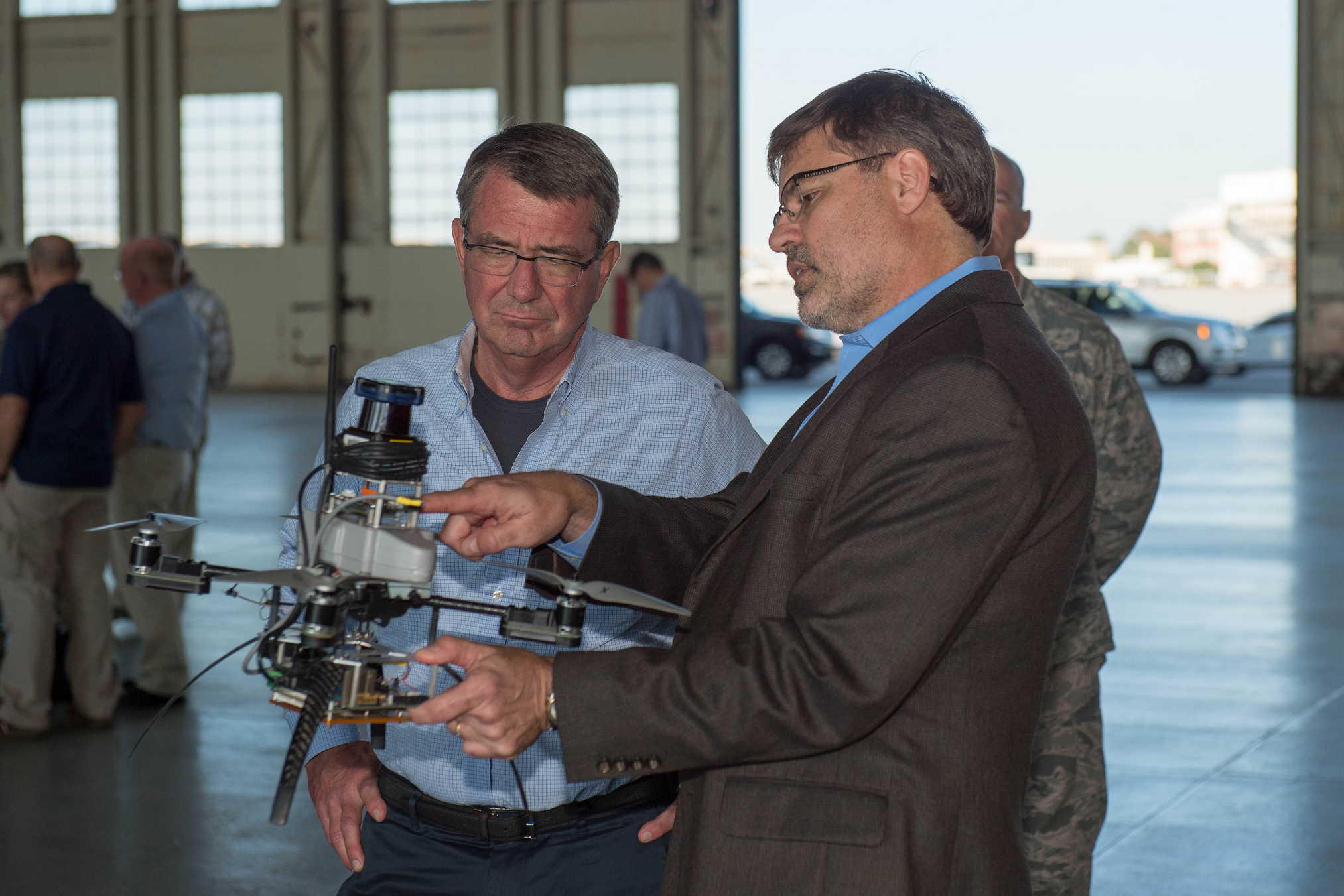 Defense Secretary Ash Carter receives a briefing on route clearance and robot operations.