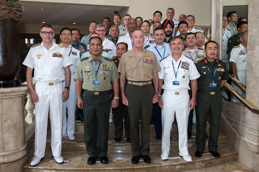 Marine Corps Gen. Joe Dunford and Navy Adm. Harry Harris Jr. pose for an official photo with attendees of the 2016 Chiefs of Defense Conference, in Manila, Philippines