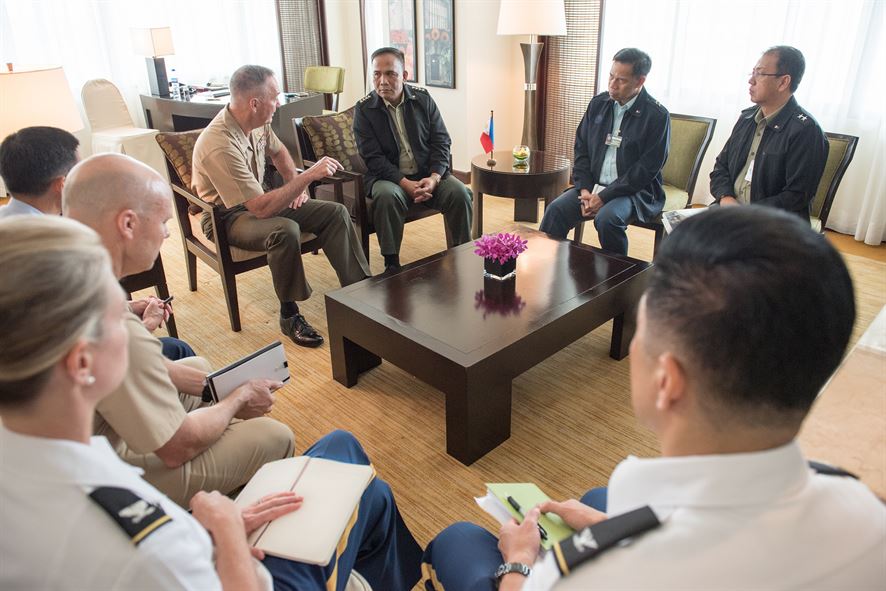 Marine Corps Gen. Joe Dunford, chairman of the Joint Chiefs of Staff, speaks with Philippine Armed Forces Chief of Staff Gen. Ricardo Visaya.