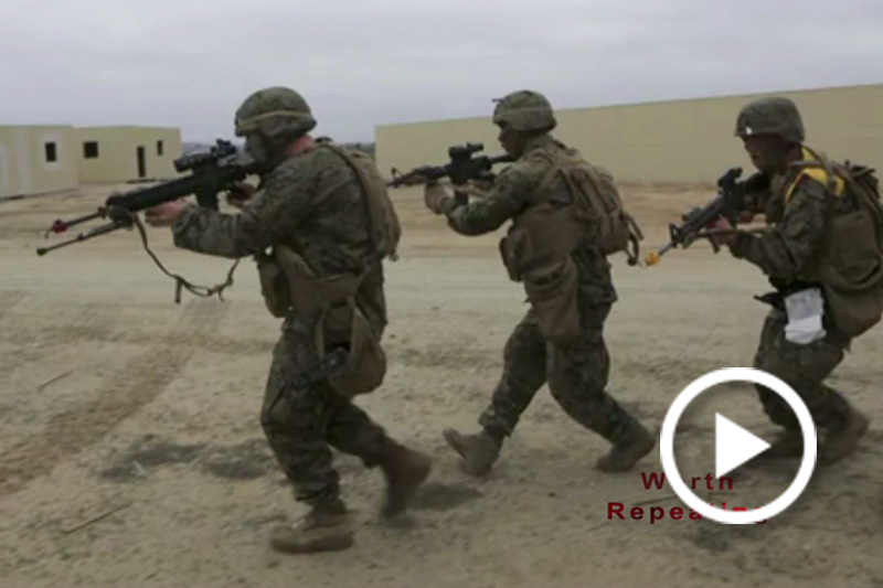Screen grab of U.S. troops running with their equipment.