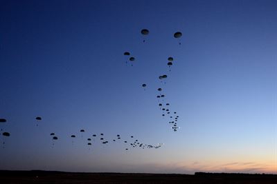 Soldiers from the 1st Battalion, 508th Parachute Infantry Regiment, conduct a static-line airdrop from an Air Force C-17 Globemaster III aircraft during Joint Operational Access Exercise 13-02 at Sicily drop zone, Fort Bragg, N.C., Feb. 24, 2013. The JOAX exercises are a combined exercises that enables U.S. and Canadian mobility aircrews to train with paratroopers from the Army's 82nd Airborne Division on projecting combat power in a denied environment -- one of the future-war challenges areas that spurred the department to launch the recent Operational Challenges Crowdsourcing Initiative. Air Force photo by Tech. Sgt. Jason Robertson