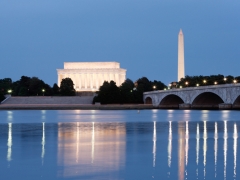 Monuments and Potomac River at night