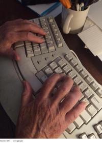 photo of elderly hands on a keyboard