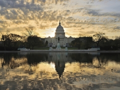 US Capitol Building with sunrise sky