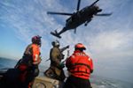 'Staying ready.
Airmen conduct hoist training with @[25633842678:274:U.S. Coast Guard]smen from @[159420070766928:274:US Coast Guard Station Shinnecock]. During this training, Guardian Angels from the 103rd Rescue Squadron were lowered via hoist from an HH-60 Pave Hawk onto the cutter's deck. 
New York Air National Guard photo by Staff Sgt. Christopher S. Muncy'