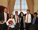 'My fellow @[22360227546:274:The University of Alabama] graduates on my D.C. staff were decked out in their crimson and white today. Who else is rooting on the Tide tonight? #RollTide #NationalChampionship'