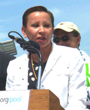 Congresswoman Nydia M. Velázquez behind a podium