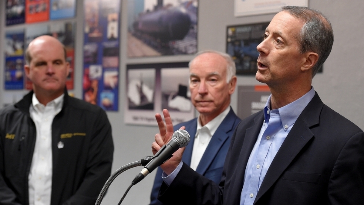 Representative Mac Thornberry, Chairman of the House Armed Services Committee, right, Rep. Joe Courtney, center, and Electric Boat President Jeffrey Geiger during a press conference at Electric Boat in Groton. (Tim Cook/The Day)