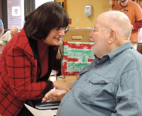 Rep Kuster talking with a citizen