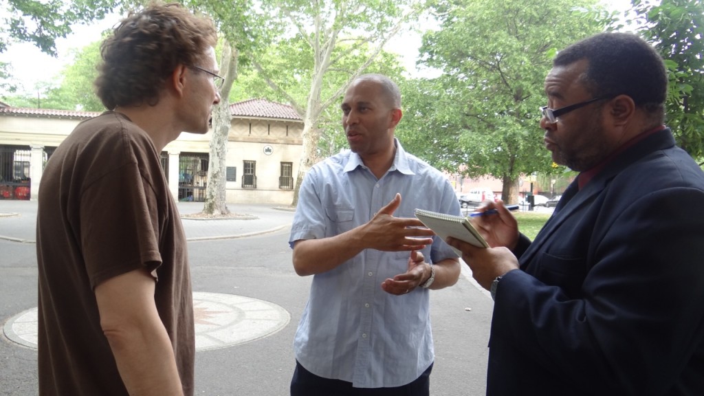 Congressman Hakeem Jeffries (D-8) meets with a Bed-Stuy resident during his "Congress on the Corner" series
