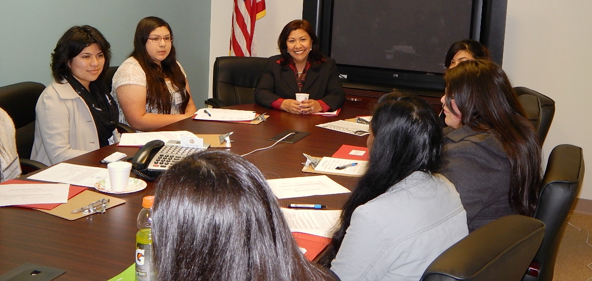 Former participants speak to Rep. Norma Torres