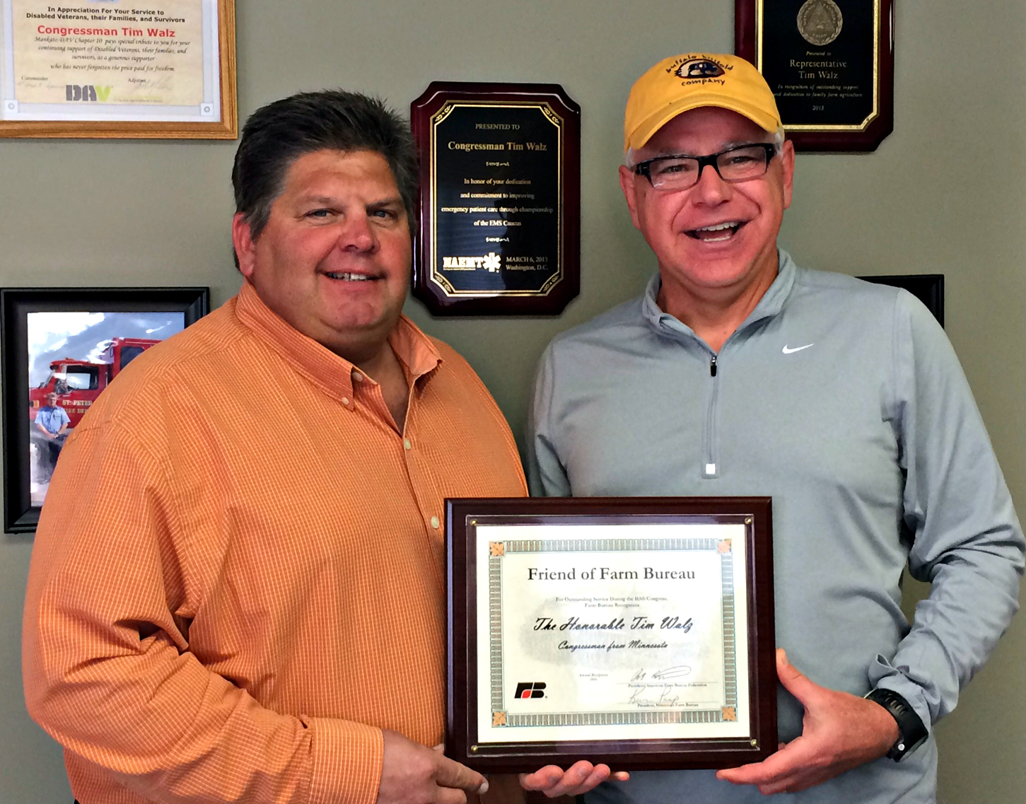 Walz recieves the Friend of Farm Bureau award from Minnesota Farm Bureau President Kevin Paap