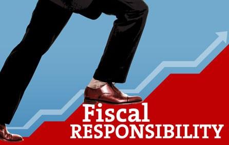 Shoes stepping on the words fiscal responsibility