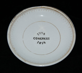Image of saucer from the 1874 party.