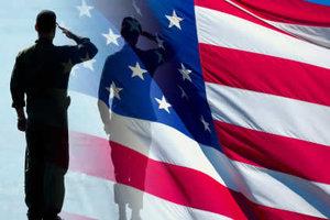 Veteran Saulting in front of American Flag