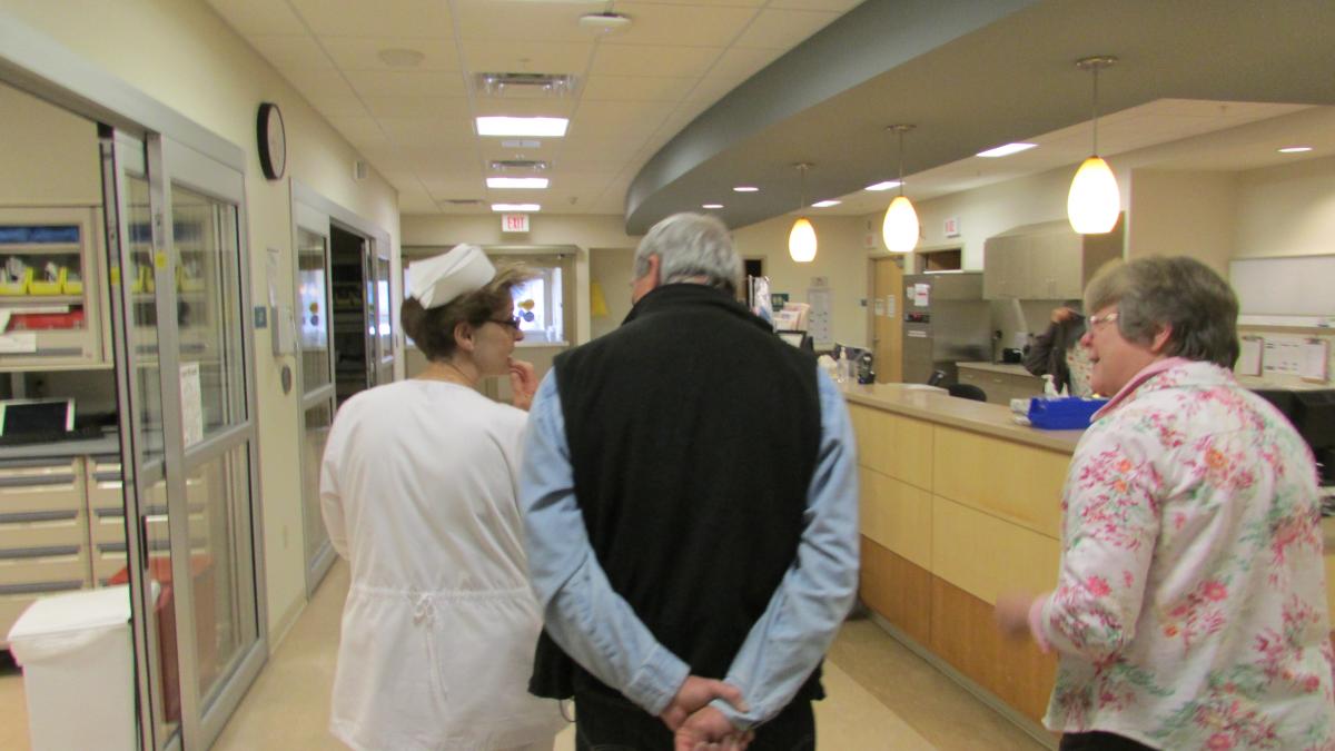 Rep. Nolan speaks with nurses at Bigfork Hospital