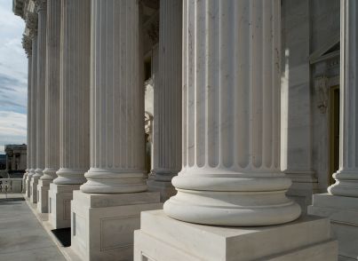 Up-close photo of columns at the U.S. Capitol.