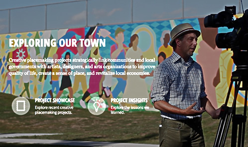 A long colorful mural in the background of all kinds of townspeople walking with an overlay of the words EXPLORING OUR TOWN and navigation links to Project Showcase and Project Insights