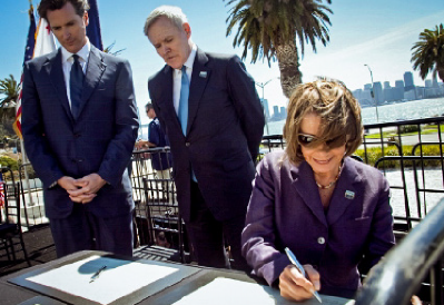 Nancy Pelosi, Navy Secretary Mabus and Mayor Newsom signing the transfer of Treasure Island to San Francisco in August 2010