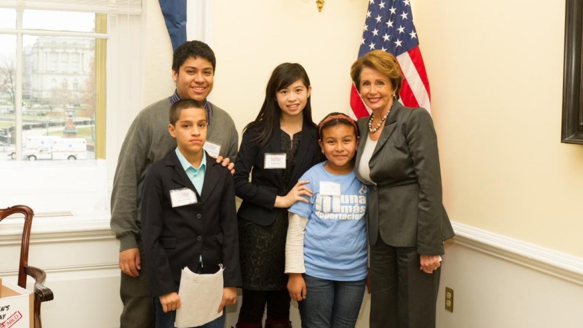 Congresswoman Pelosi and children from We Belong Together, including San Franciscan Nashali de la Rosa, discussing the urgency of comprehensive immigration reform.