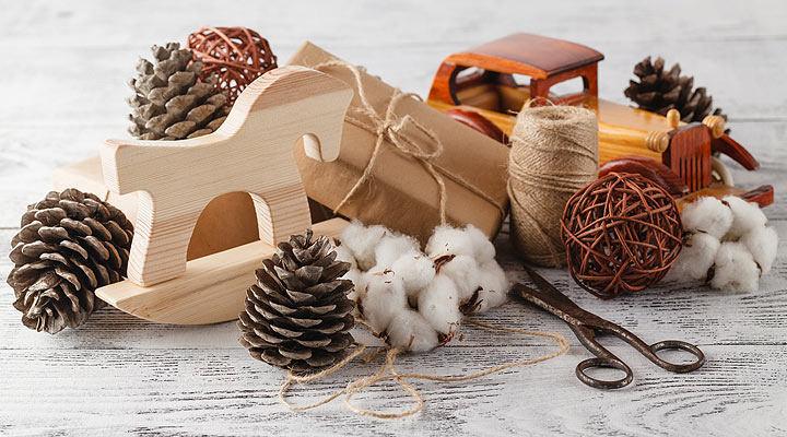 Woodentoys with brown paper wrapping paper and natural string