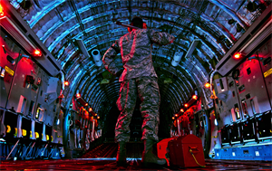 Senior Airman Joseph Farrell checks the inside of the C-17 Globemaster III before beginning a preflight inspection March 27, 2013, at Wright-Patterson Air Force Base, Ohio. Farrell is an electronic warfare systems journeyman assigned to the 445th Aircraft Maintenance Squadron. The C-17 can take off and land on runways as short as 3,500 feet and 90 feet wide. (U.S. Air Force/photo Staff Sgt. Mikhail Berlin)