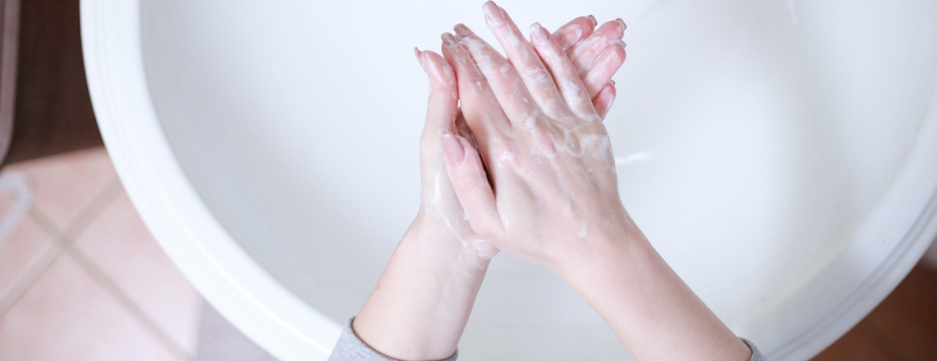 Image of a person washing their hands