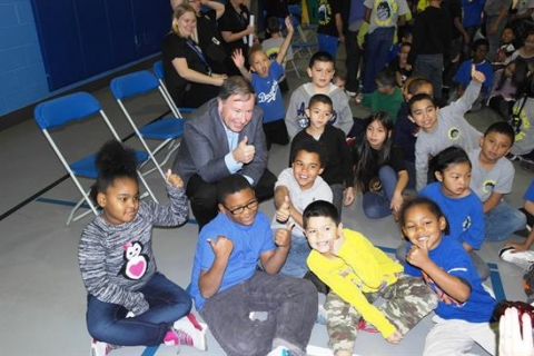 Congressman Lamborn sitting with children