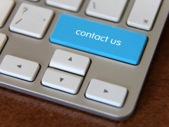 Laptop button says contact us