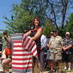 Cheri works hard every day to honor the sacrifices of veterans and service members. On Memorial Day this year, she spoke at the LZ Peace Memorial in Rockford, honoring those who fought in Vietnam and died from the effects of Agent Orange.