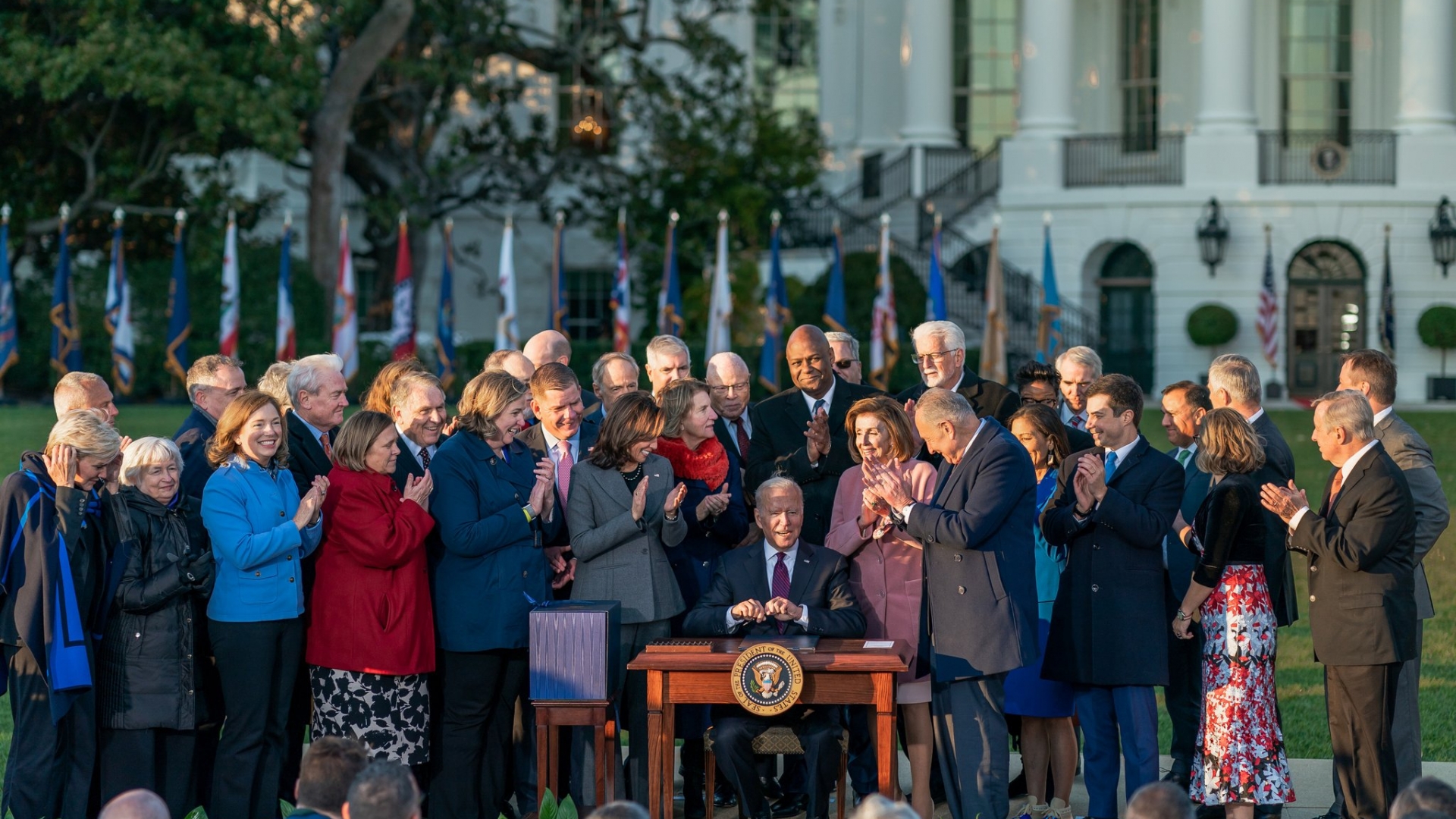 Pelosi and others gather for President Biden signing the bipartisan Infrastructure Bill